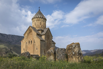 Fototapeta na wymiar old stone church in a landscape of Armenia