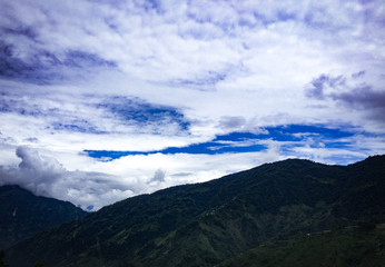 Obraz na płótnie Canvas Clouds over mountains