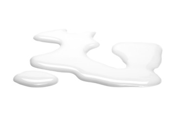 Obraz premium Spilled milk puddle isolated on white background and texture
