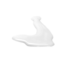 Spilled milk puddle isolated on white background and texture