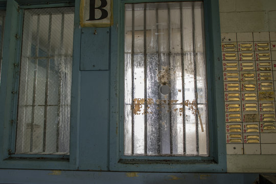 View through bars from guard station to prison cellblock