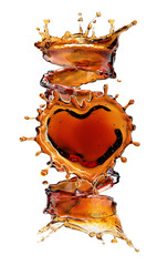 Fototapeta na wymiar Heart from cola splash with bubbles isolated on white