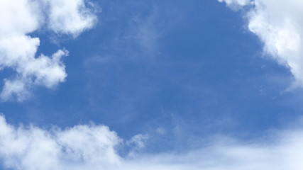White clouds over blue sky