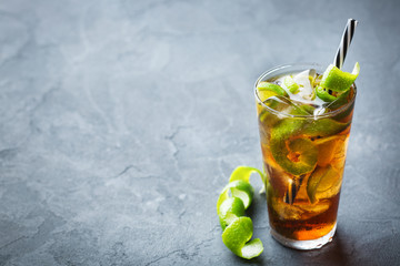 Cuba libre alcohol cocktail drink with rum, cola, ice, lime