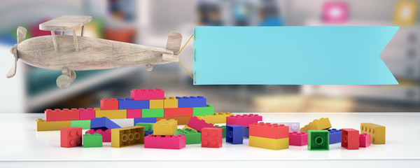 Plastic building blocks,plane and blur background