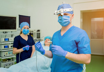 Fototapeta na wymiar Laser vaporization of nasal concha with coblation technology method. Endoscopic sinus surgery.