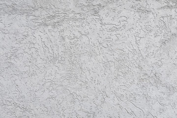 architectural detail representing gray decorative concrete surface with irregular texture