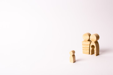 Wooden figures of a man and a woman with a void inside the body in the form of a child. Infertility...
