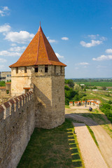 Fototapeta na wymiar Old fortress on the river Dniester in town Bender, Transnistria. City within the borders of Moldova under of the control unrecognized Transdniestria Republic in summer sunny day.