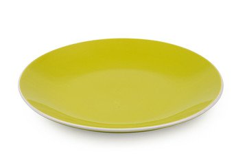 Green ceramic plate isolated on white background