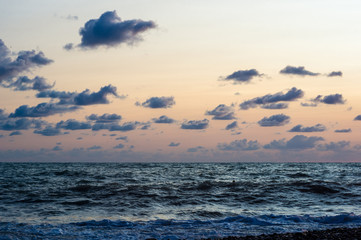 Amazing sea sunset, the sun, waves, clouds