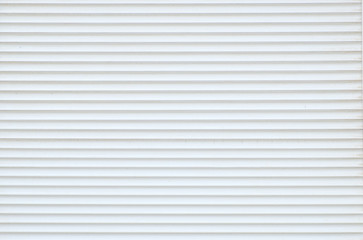 Fototapeta premium Cassette roller blinds on the windows. abstract background texture