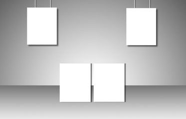 Empty white posters on gray background
