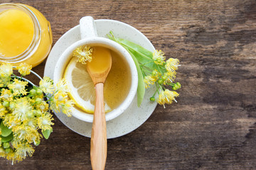 linden flowers, herbal medicine, Cup of healthy  tea with honey and lemon.  alternative or complementary medicine, traditional medicine. soft focus image