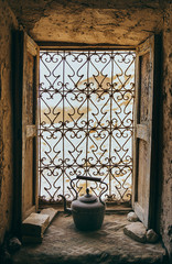 Fototapeta na wymiar arabic teapot near to a window