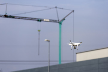 Modern drone flying outdoor, RF photo, no logos or trademarks