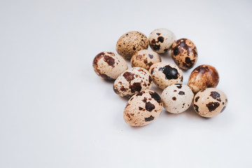 Fresh quail eggs on white background