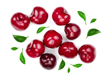 Sweet red cherries with leaves isolated on white background. Top view. Flat lay pattern