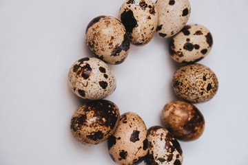 Fresh quail eggs on white background