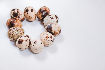 Fresh quail eggs on white background