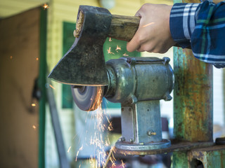 grinding axe with sparks close up