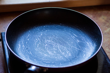 a skillet with butter in the kitchen