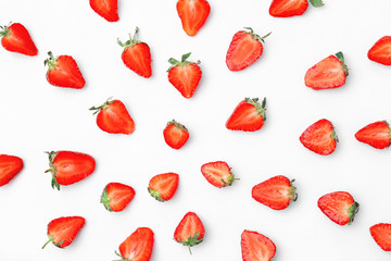 Composition with ripe red strawberries on light background