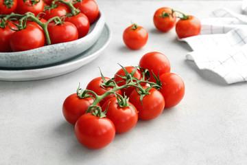 Fresh ripe red tomatoes on table