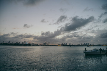 Pink sunset over miami downtown from the sea