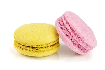pink and yellow macaroon isolated on white background closeup