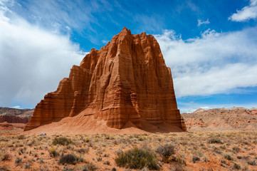 Fototapeta na wymiar Temple of the Sun, Capitol Reef National Park, Utah. A remote, stark desert characterized by amazingly beautiful sandstone monoliths that some say resemble cathedrals.