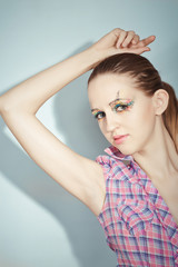portrait of beauty girl with colorful make-up and long hair