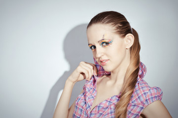 portrait of beauty girl with colorful make-up and long hair