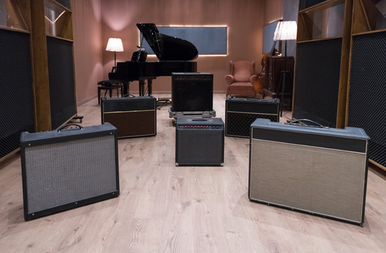 Set of amplifiers near piano