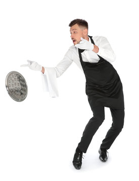 Clumsy Waiter Dropping Empty Tray On White Background