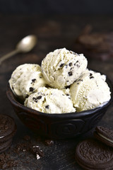 Homemade vanilla ice cream with chocolate and cookies.