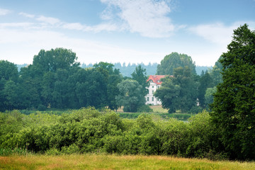 Wedendorf Castle, the former manor house on the lake is today a museum and hotel in the idyllic...