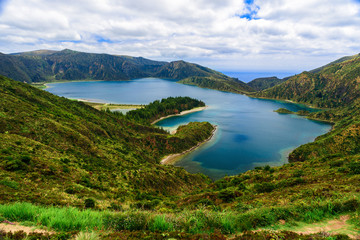 Fototapeta na wymiar Beautiful view of lake lagoa do Fogo from the mountains on San Miguel Island, Azore