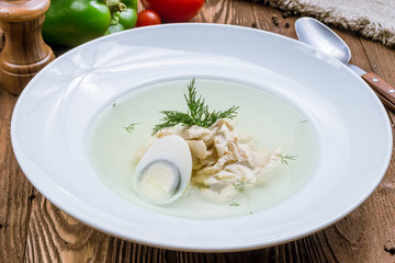 Chicken soup bouillon in a plate