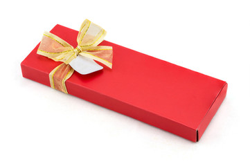 Red gift box with gold ribbon on white background.