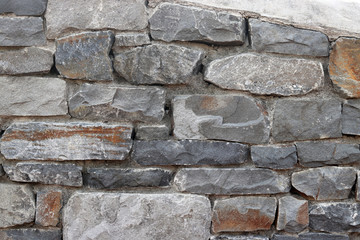Rough stone wall background.