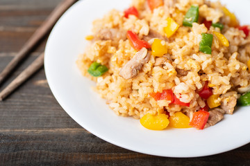 Fried rice with vegetables and pork, Asian cuisine