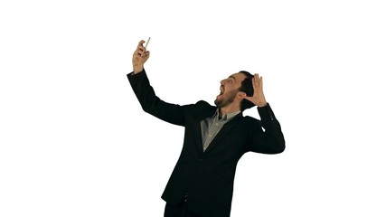 Obraz premium Businessman taking a selfie on white background isolated