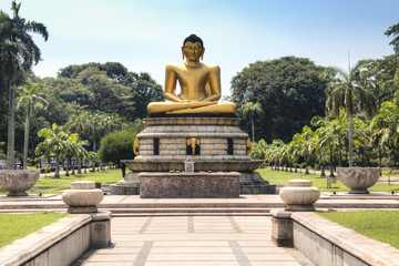 Golden buddha statue in Colombo, Sri Lanka.