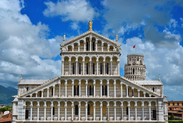 Square of Miracles landmarks: Pisa Cathedral and the famous Leaning Tower among beautiful clouds
