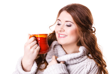 Woman holding red tea coffee mug