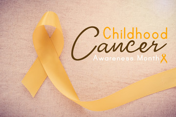 yellow gold ribbon, world childhood cancer awareness month