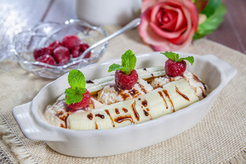 Banana split sundae ice cream in a bowl 