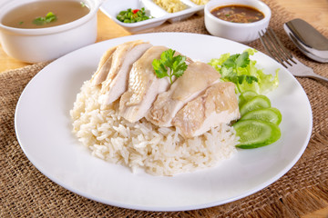 hainanese boiled chicken rice on the wooden table