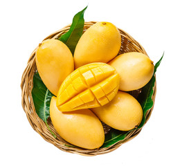 fresh Yellow mango Beautiful Skin In the basket isolate